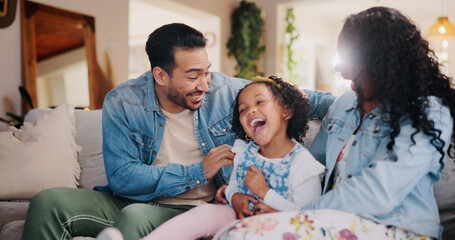 Parents, girl and tickle on couch, laugh and bonding with love, comic joke and relax in lounge at...