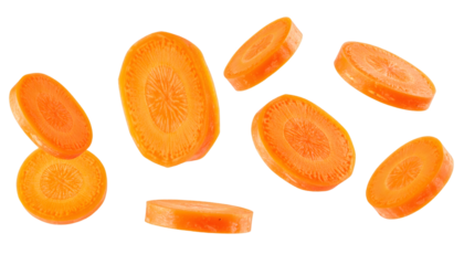 Multiple carrot slices falling with transparent background