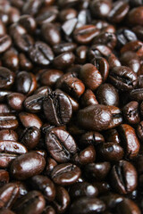 Pile of roasted coffee beans. Coffee beans background