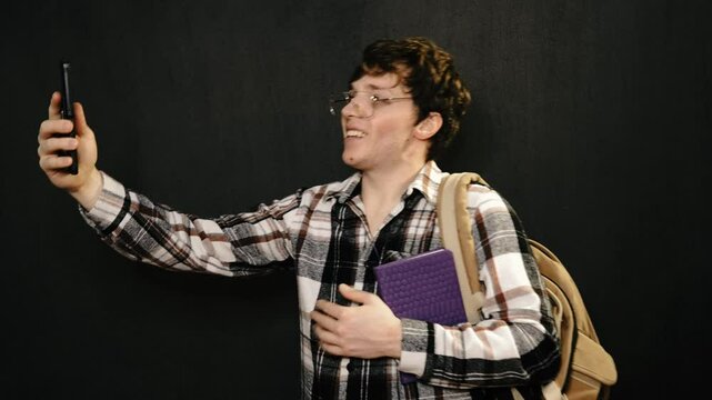 Young attractive man preparing for exams