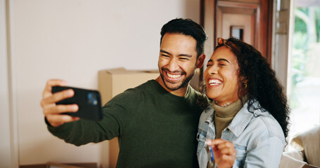 Couple, selfie and keys with new home, property and finance investment together. Man, woman and...