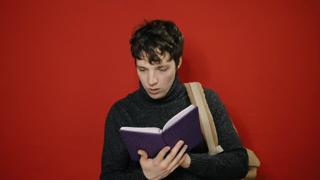 Young attractive man preparing for exams