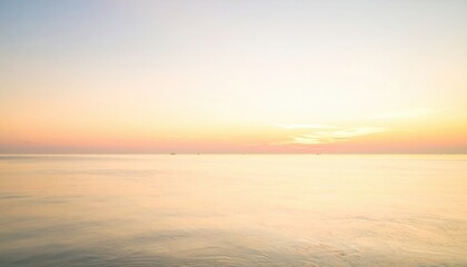 Fototapeta premium Sunrise reflections over calm ocean waters tranquil beach nature photography serene environment wide angle view
