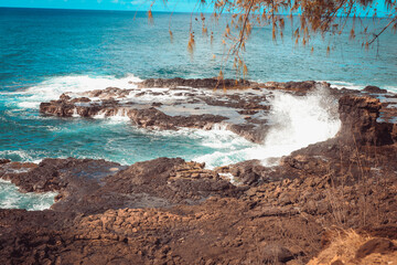Spouting Horn is off the southern coast of Kauai in the Koloa district and is known for its...