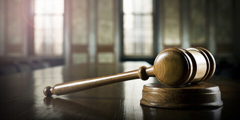 Abstract background. Law and justice concept with the morning sunlight and the judge's gavel...