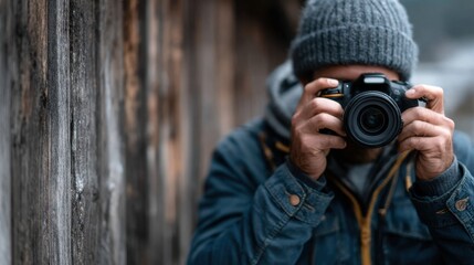 Obraz premium Photographer Capturing Moment in Nature