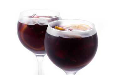 Refreshing Summer Citrus Fruit Sangria in crystal glass isolated on white background