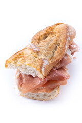 Spanish serrano ham sandwich isolated on white background