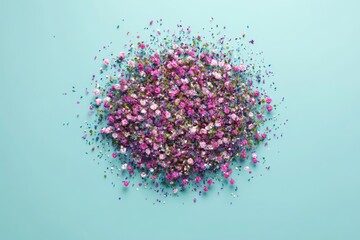 Overhead View of Colorful Sprinkles Pile a Festive Heap for Celebrations Against Light Blue Backdrop Macro Texture and Bright Studio Lighting