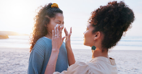 Mother, girl and sunscreen application at beach for uv protection, care and love on vacation in...