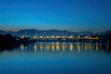 Fototapeta premium Panoramic view of Sao Paulo city skyline with the hills in the background, a bridge over the river, and buildings.