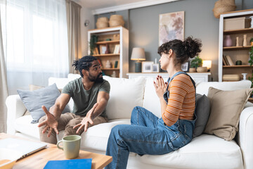 Young couple, a man and a woman, discuss difficult philosophical, sociological and psychological...