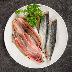 Sardine raw fish fillet seafood anchovy filet fresh delicious gourmet food background on the table rustic food top view copy space pescetarian diet