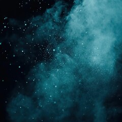 Obraz premium Abstract teal dust explosion against black background studio shot of powder cloud with bokeh effect for artistic design