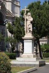 Obraz premium 18th century statue of Saint Agatha, holding book and cross in front of Catania Cathedral in Catania, Sicily, Italy