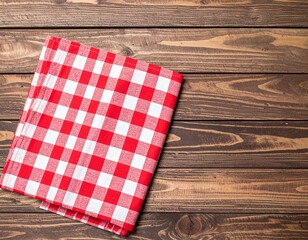 Obraz premium Red checkered tablecloth on empty wooden table. 