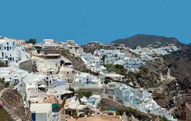 Oia village on the edge of cliffs at Santorini, Greece