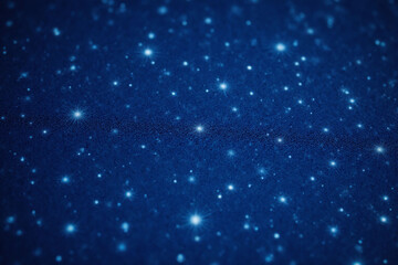 Obraz premium blue glittery background with stars in the sky