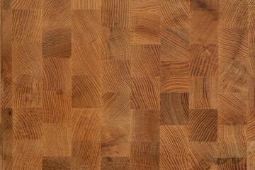 High-resolution image of a brown wooden butcher block surface, ideal for backgrounds and textures.