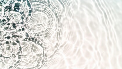 Blue water with ripples on the surface. Defocus blurred transparent blue colored clear calm water surface texture with splashes and bubbles. Swimming pool top view close up.