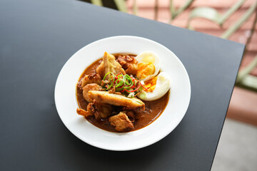 Batagor, made from fish or chicken dumpling, tofu, tapioca flour served with peanut sauce. Indonesian food

