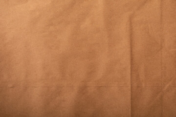 High-resolution image of brown kraft paper texture, perfect for backgrounds and design projects.