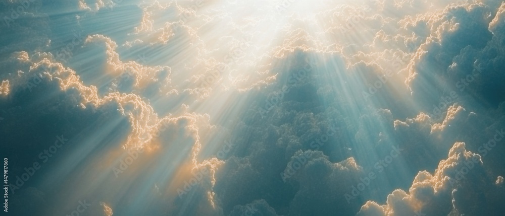 Poster aerial view of fluffy clouds with sun rays shining through the gaps creating a heavenly atmosphere i