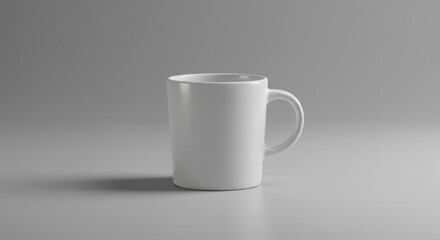 Obraz premium Minimalist presentation of a pristine white mug in a neutral grey setting