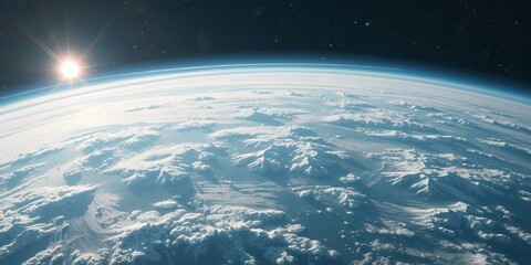 Fototapeta premium Stunning Earth Sunrise View from Space Showing Snowy Mountains and Cloudscape
