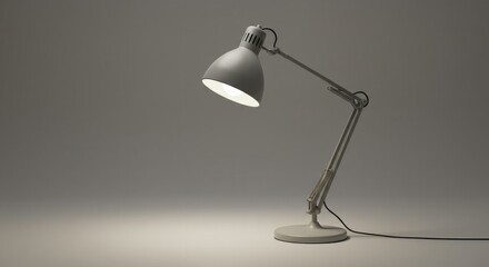 Illuminating creativity: A minimalist gray desk lamp casting light
