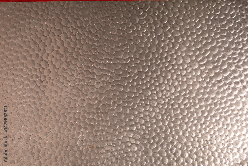 Poster High-resolution image of a hammered metal sheet with a pebble texture. Ideal for backgrounds and design projects.