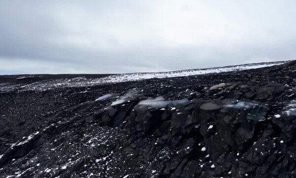 lava rock and snow in winter time in Iceland