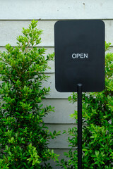 Welcoming Open Sign for Your Local Shop Entrance