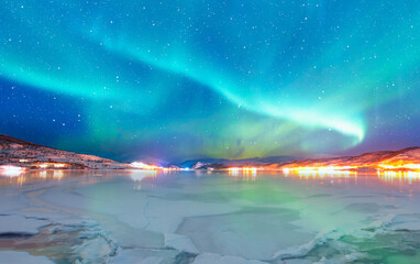 Northern lights or Aurora borealis in the sky - Tromso, Norway