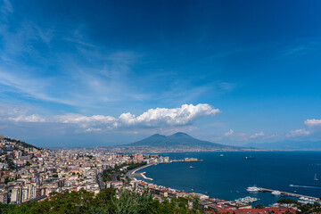view of the city of naples, italy with mount vesuvius
