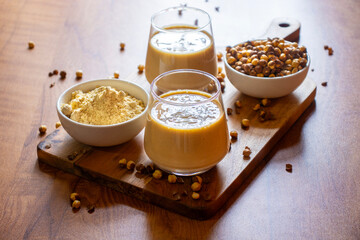 Sattu drink is a traditional, refreshing beverage made from roasted gram flour, often mixed with water, spices, and sometimes sweeteners, offering energy and digestive benefits.
