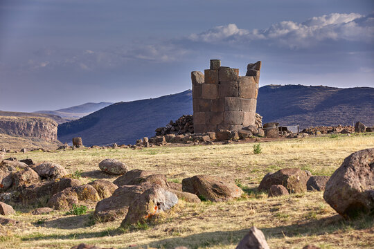 Echoes of the past by Lake Umayo.The ancient chullpas of Sillustani rise proudly against the stunning backdrop of the Andean highlands. These majestic stone towers, once burial sites, hold stories.