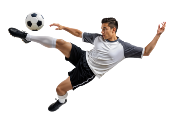 Dramatic overhead sideways scissor kick on a ball by soccer athlete