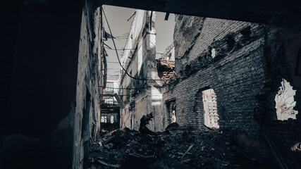 Fototapeta premium ruined street and destroyed houses the city war in Ukraine
