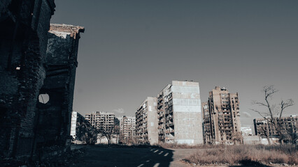 ruined street and destroyed houses the city war in Ukraine