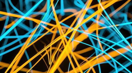 Abstract artwork featuring vibrant, intertwined blue and orange lines against a black background
