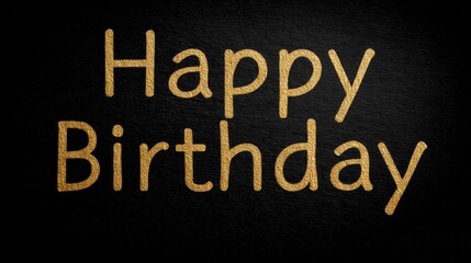 Obraz premium Golden Happy Birthday text on black background for celebration greeting card.