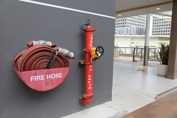 Fire hose and hydrant in Singapore City public building