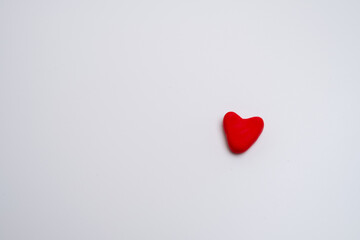 Red heart on light background. Health, medicine and charity concept 
