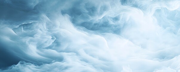 Fototapeta premium Delicate, light blue cloud formations in the sky.