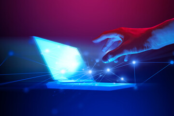 The hand of a businessman interactive touching a holographic laptop of network, symbolizing the...