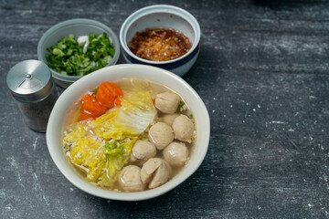 Chinese cabbage soup, carrots, minced pork, and fish balls