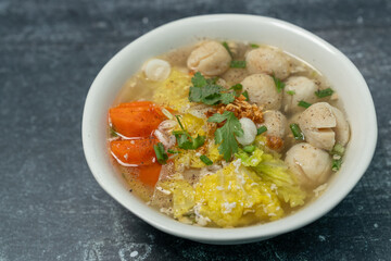 Chinese cabbage soup, carrots, minced pork, and fish balls