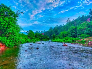 landscape with river and blue sky