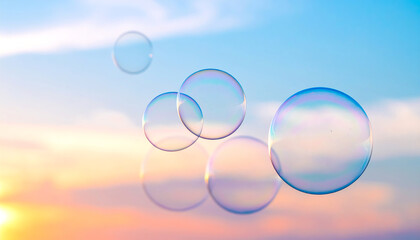 Colorful soap bubbles float against a dreamy sunset sky, creating a whimsical and serene atmosphere
